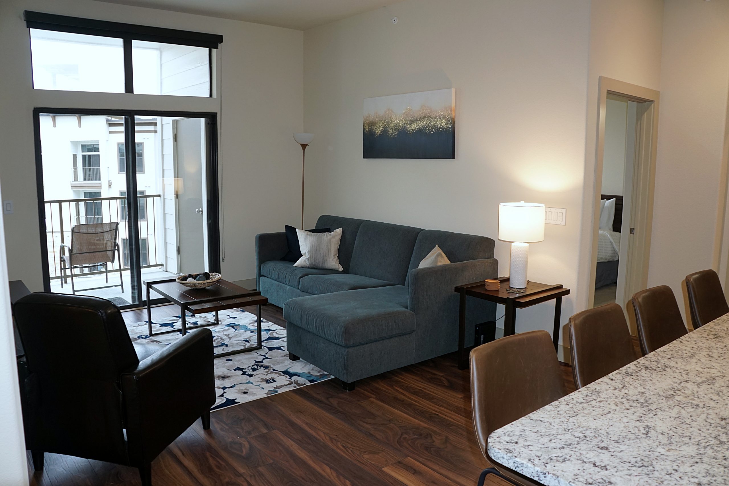 Kitchen view of living room of the Florida design at Premier Patient Housing.