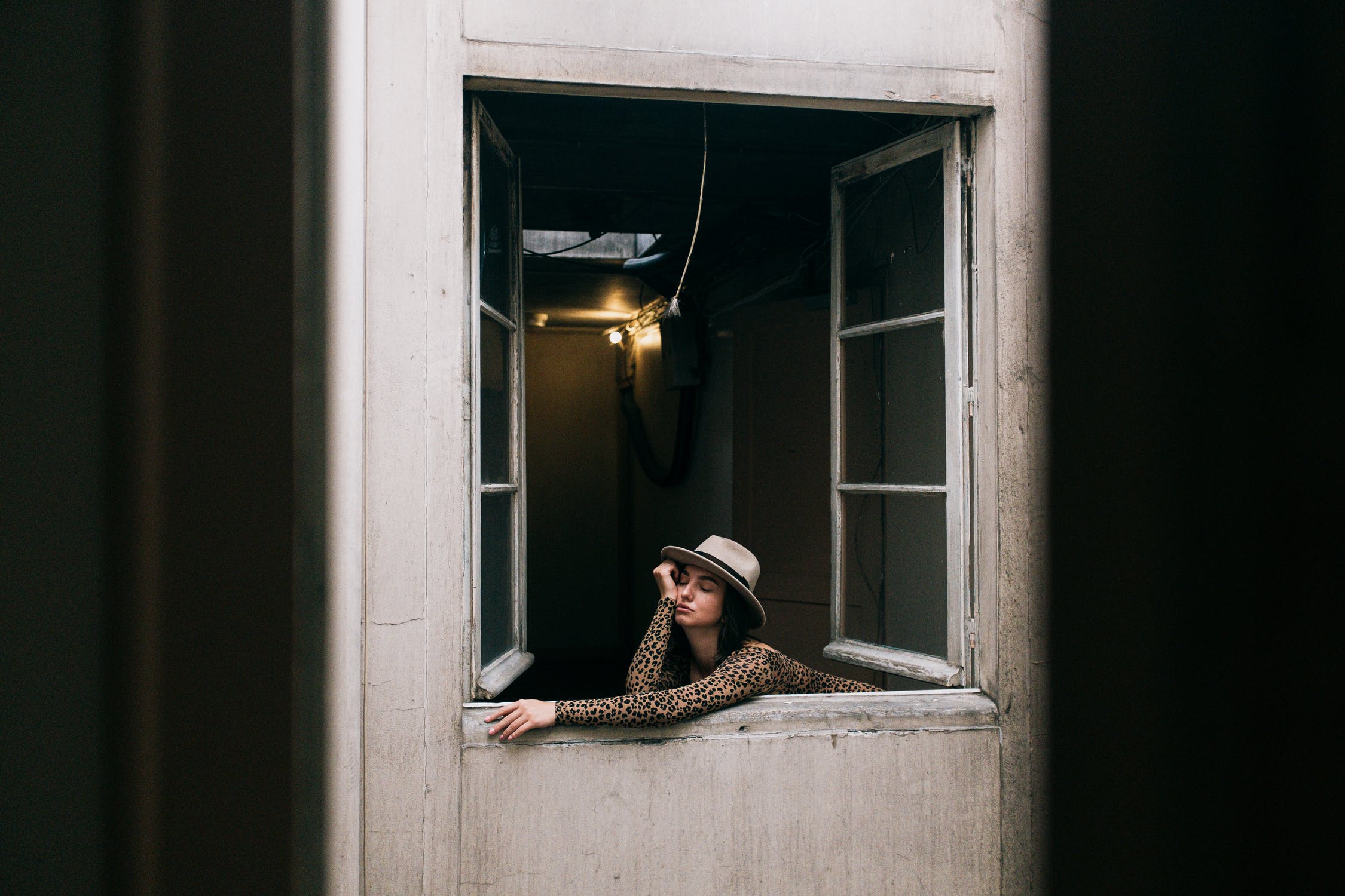 Girl Social Distancing on apartment balcony.