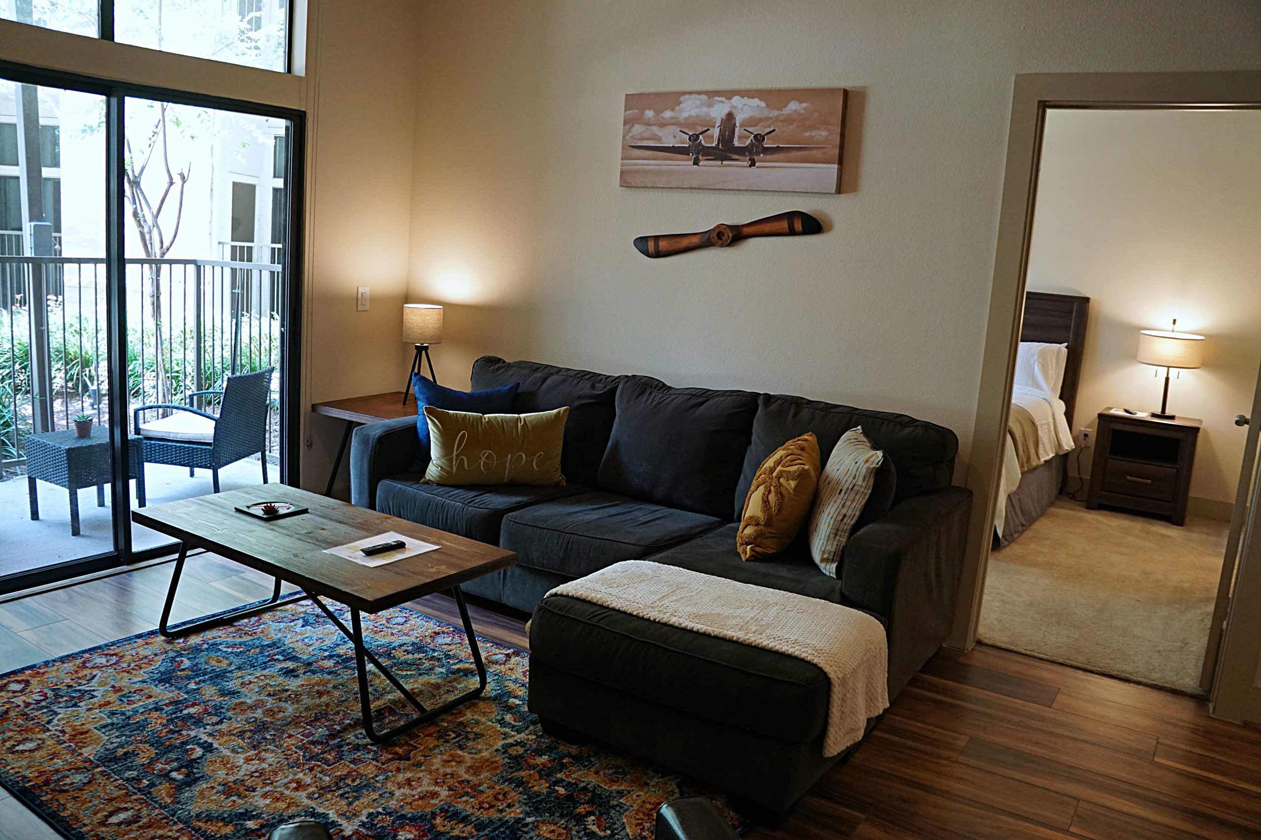 Second bedroom view of living room of the Ohio design at Premier Patient Housing.