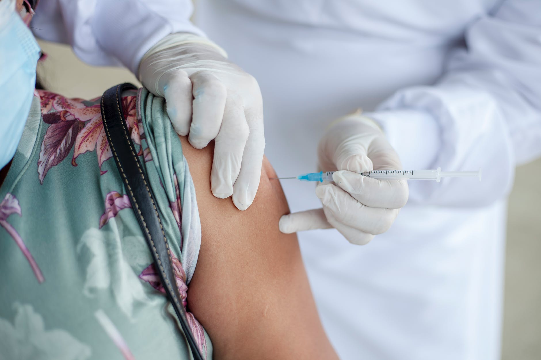 teen or adult receiving a vaccine 