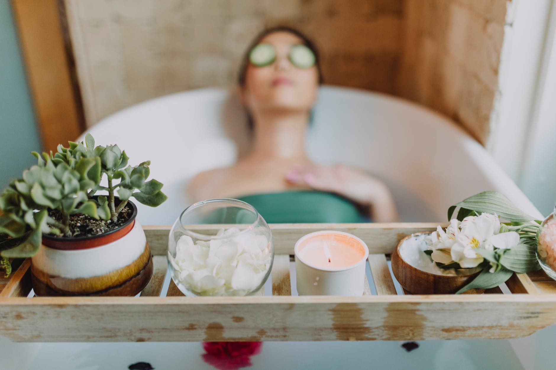 woman relaxing in bath tub 