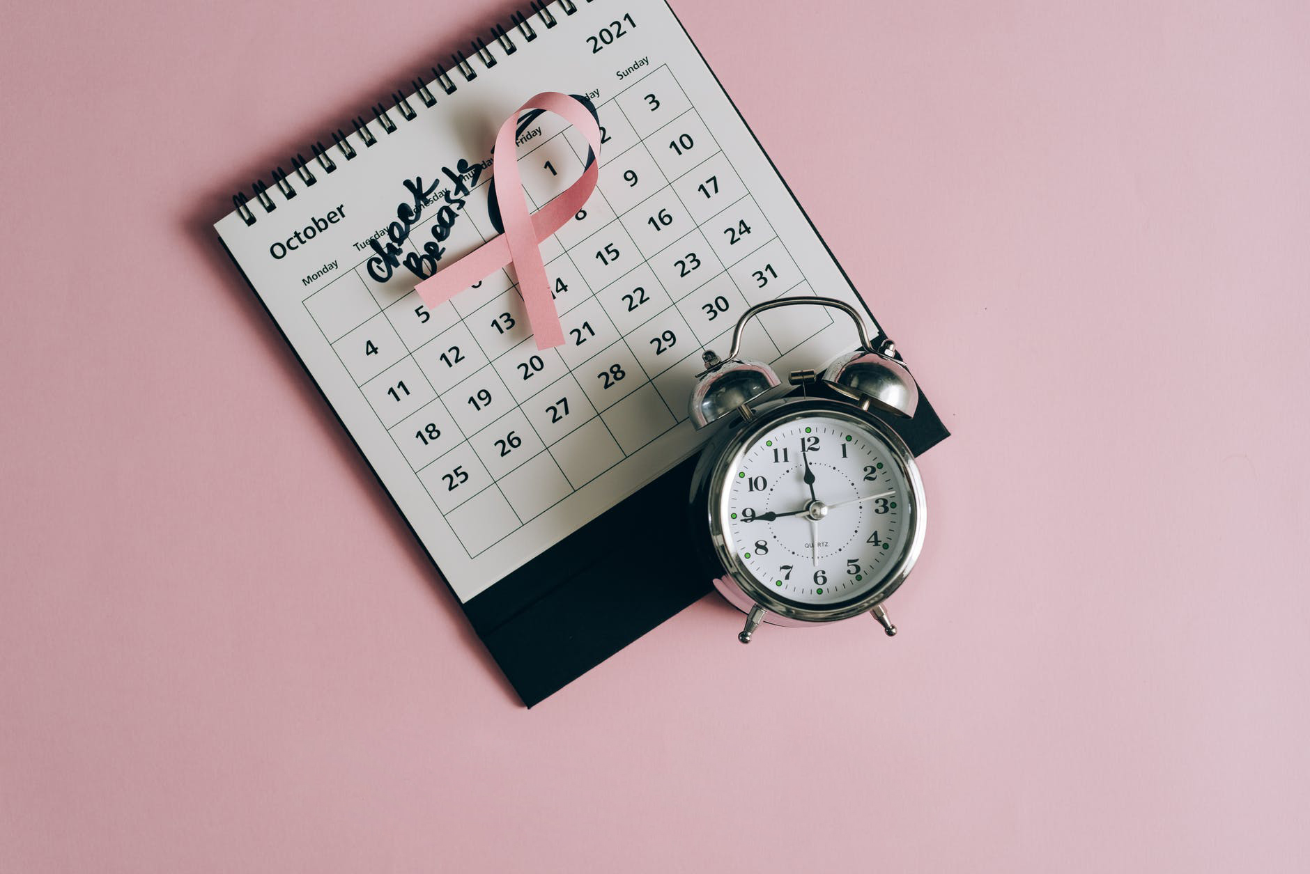 calendar and clock for breast cancer check 