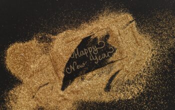 happy new year written with glitter